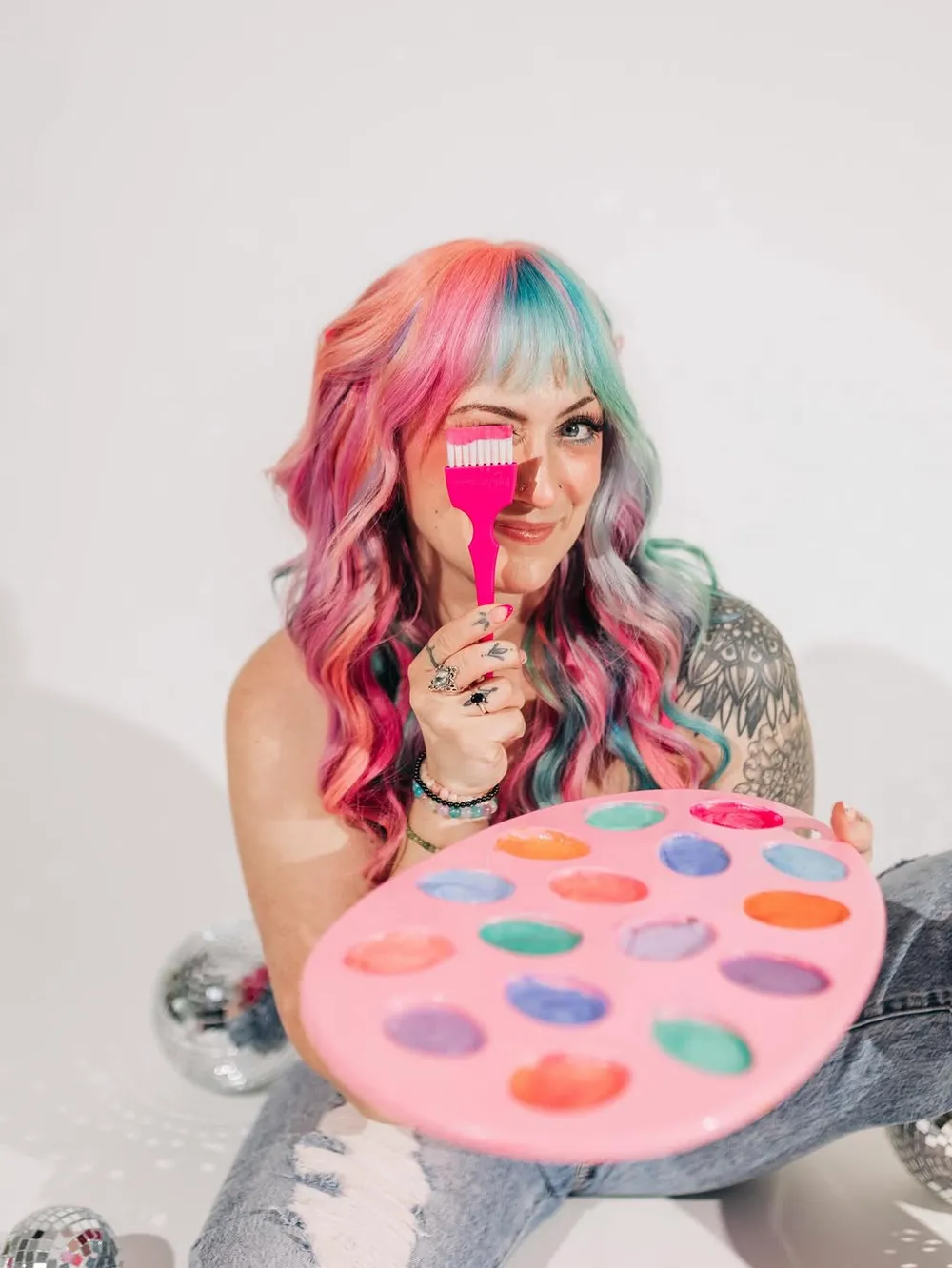 Promise Downs, an on-site hair stylist at SMP Creative Studio